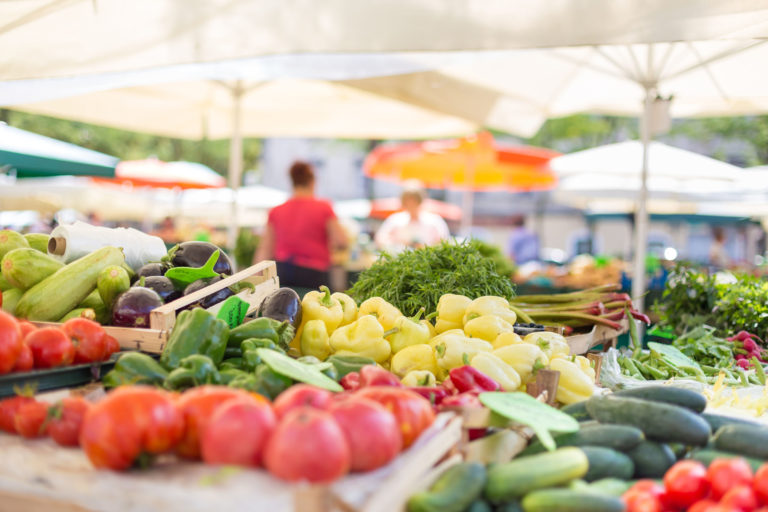 Farmers' food market stall with variety of organic vegetable. Farmers' food market stall with variety of organic vegetable.