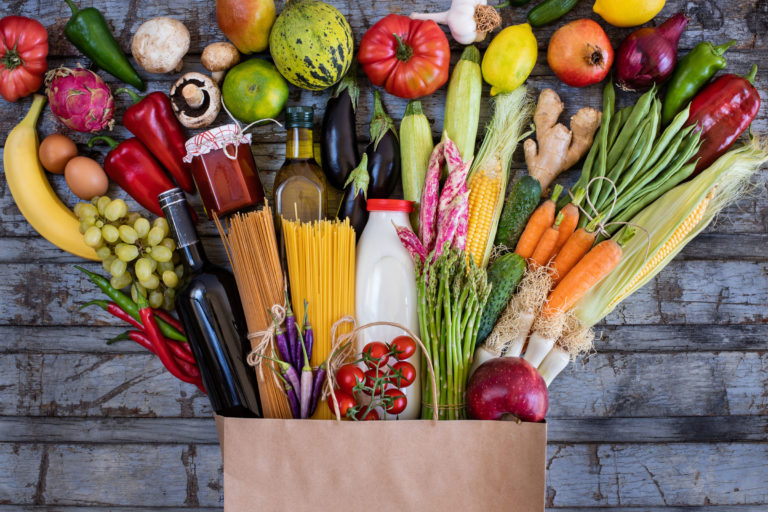 Fresh vegetables in the paper bag.